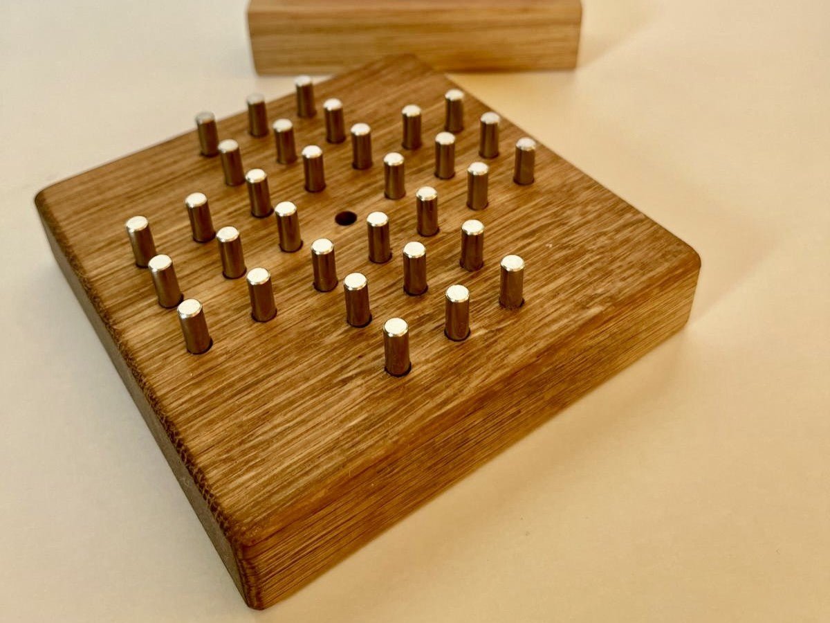 Solitär: Das zeitlose Holzspiel für jede Generation