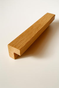 Oak furniture handle in L-shape
